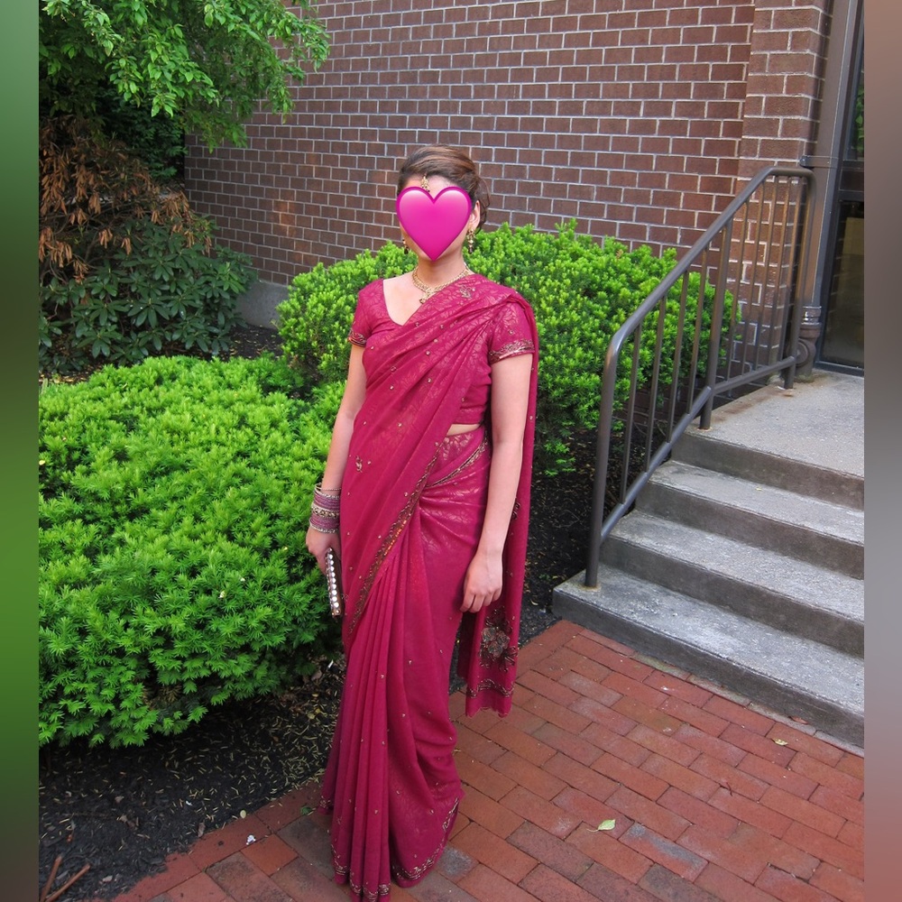 Elegant Magenta Sari with Gold Accents